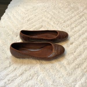 Brown croc-leather flats. Good condition.